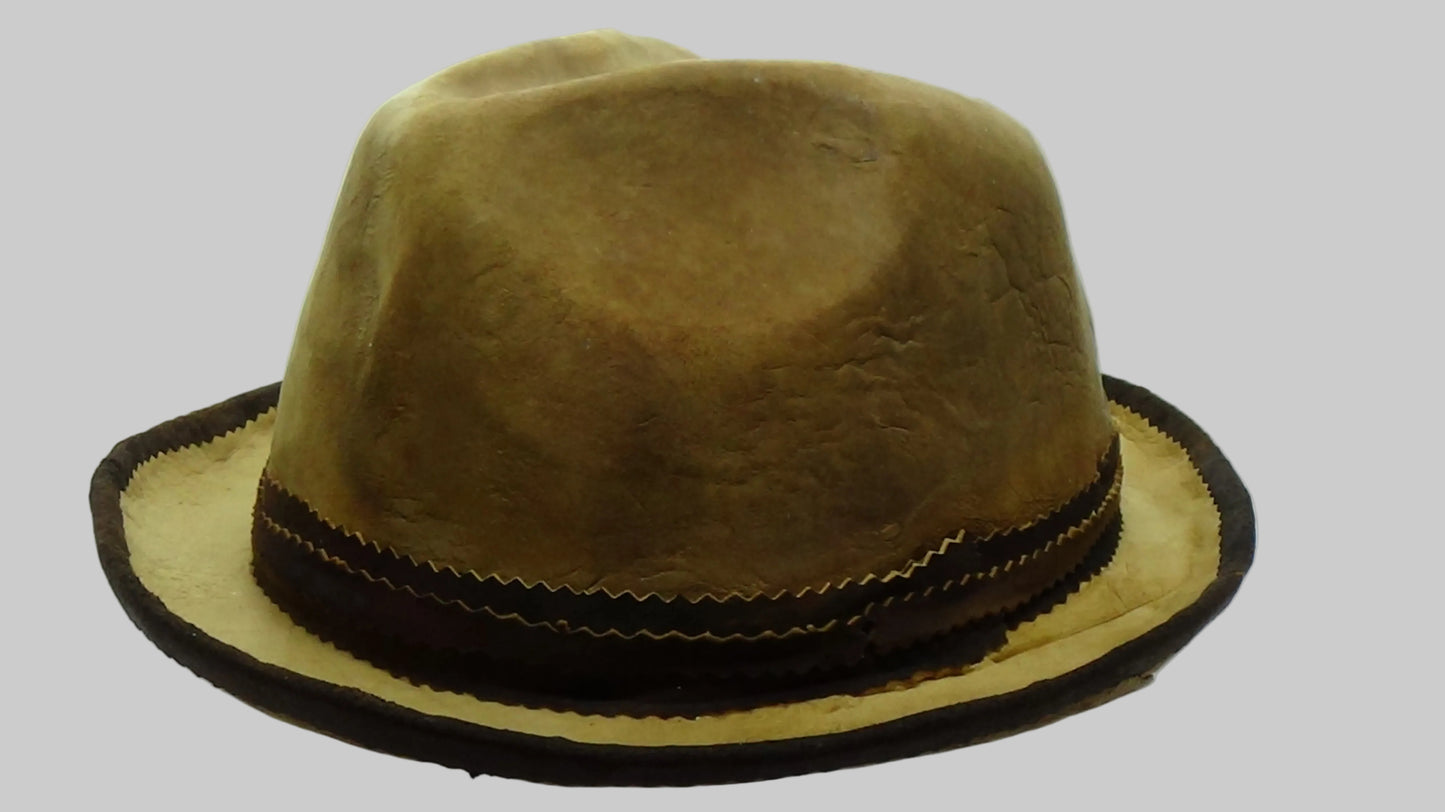 Brown amadou fedora hat with a black band on a white background
