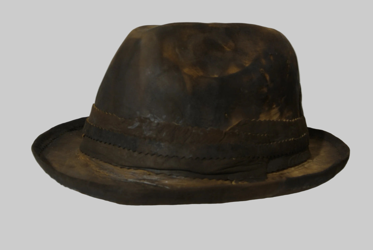 Brown amadou fedora hat on a white background