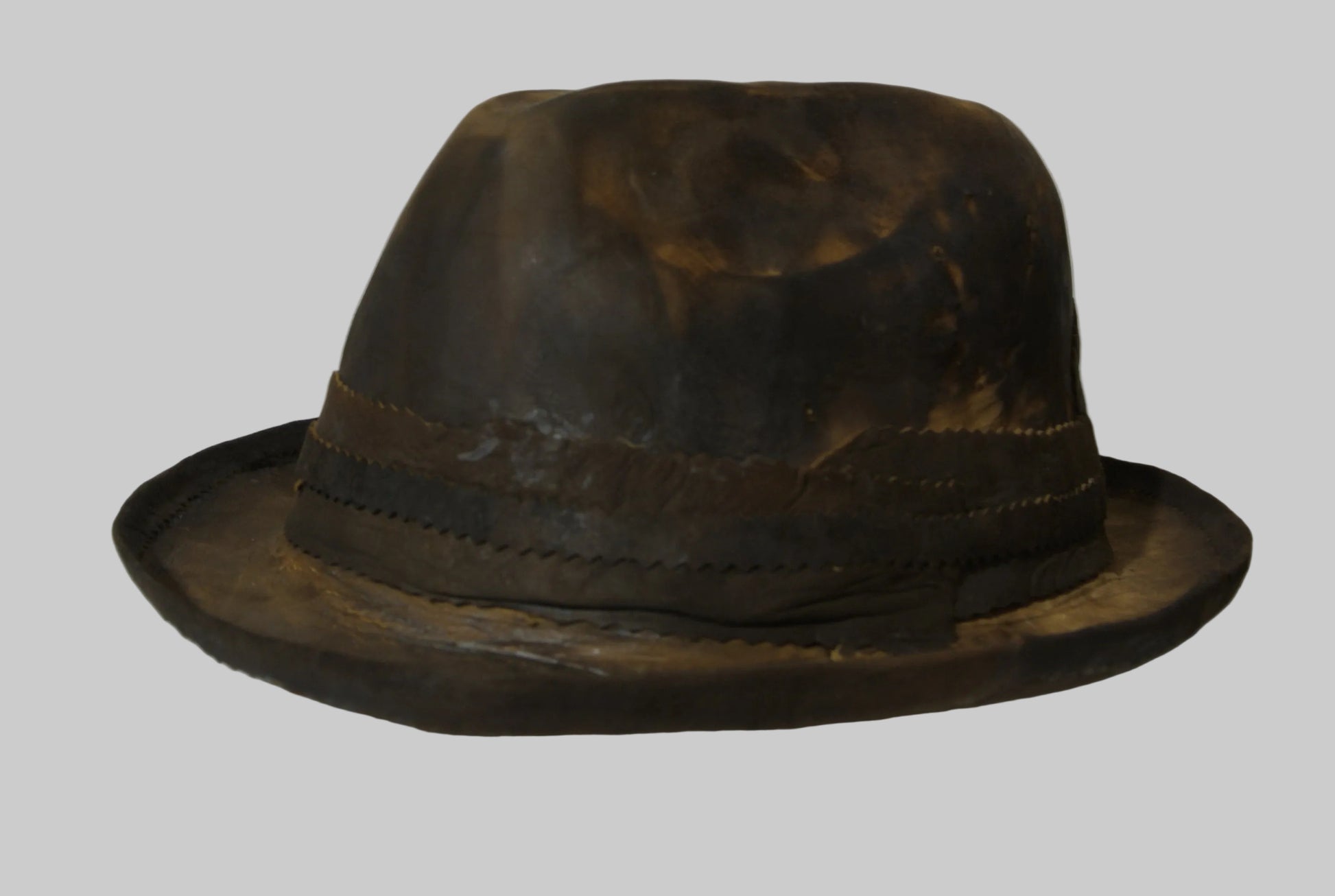 Brown amadou fedora hat on a white background