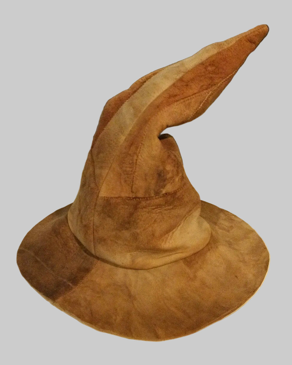 Brown wizard amadou hat on a white background 