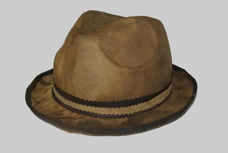 Brown amadou fedora hat with a black band on a white background